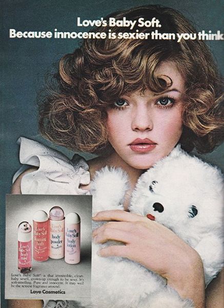 Disturbing 1970s perfume advert with a pre-pubescent girl with permed hair and makeup, holding a teddy, with the slogan 'Love's Baby Soft. Because innocence is sexier than you think.'